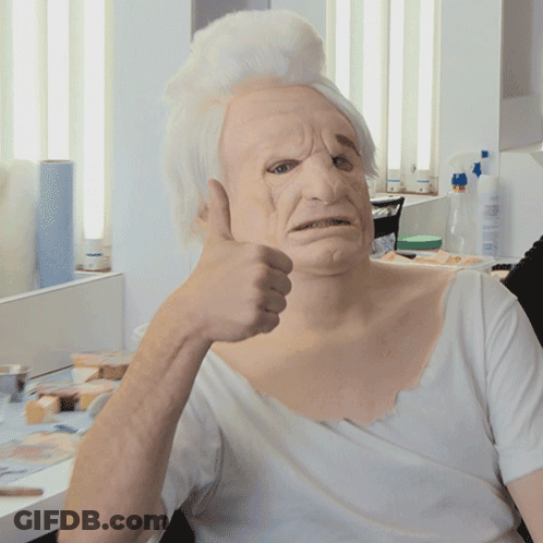 Man In White Mask Giving Thumbs Up GIF