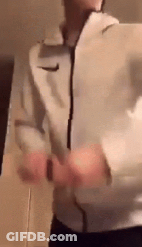 Man In White Nike Jacket Standing GIF