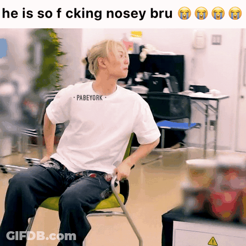 Man In White Pabeyork Shirt Sitting In Chair GIF