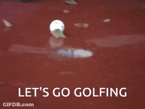Man In White Polo And Blue Pants Standing In Front Of Building GIF