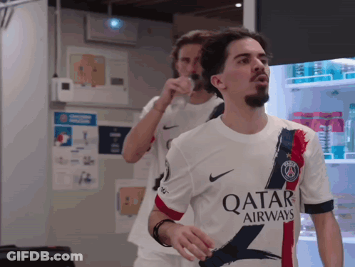 Man In White Qatar Airways Shirt GIF