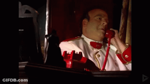 Man In White Red Uniform Talking On Red Phone 19 GIF