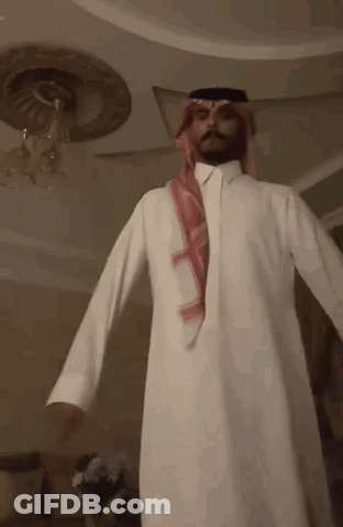 Man In White Robe And Red Scarf GIF
