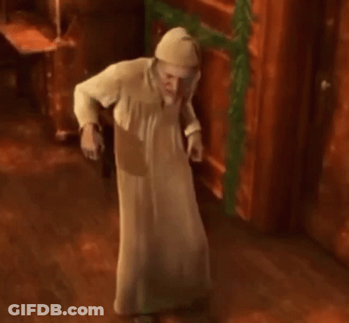 Man In White Robe And White Hat Dancing In Room GIF