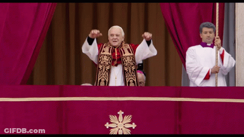 Man In White Robe Arms Outstretched GIF