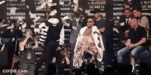 Man In White Robe At Mayweather Wall GIF