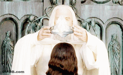 Man In White Robe Drinking From Silver Bowl GIF