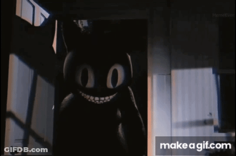Man In White Robe Holding Bottle In Front Of Happy Birthday Sign GIF