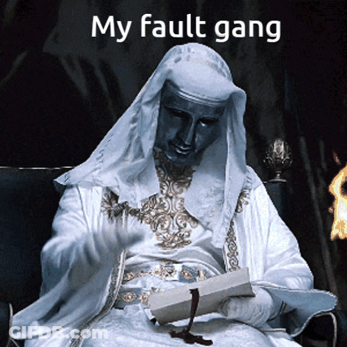 Man In White Robe Holding Paper Saying My Fault Gang GIF