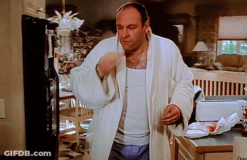 Man In White Robe In Front Of Dove Toaster GIF
