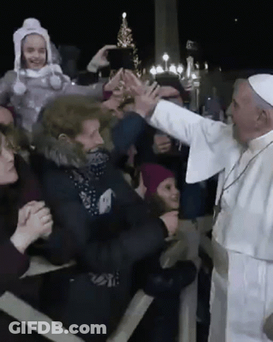 Man In White Robe Reaching To Crowd GIF