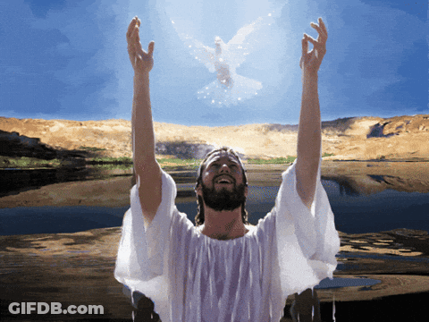 Man In White Robe With Arms Outstretched In Front Of Lake GIF