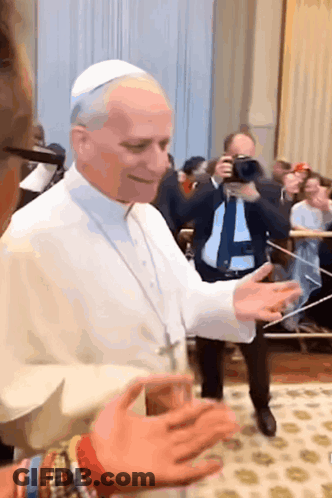 Man In White Robe With Letter A GIF