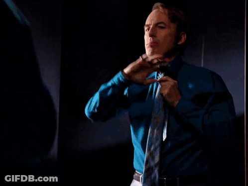 Man In White Shirt Adjusting Red Tie GIF