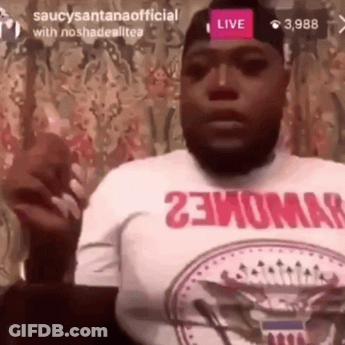 Man In White Shirt And Black Hat Giving Speech GIF