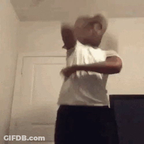 Man In White Shirt And Black Pants GIF