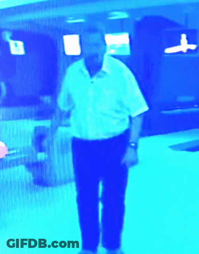 Man In White Shirt And Black Pants GIF