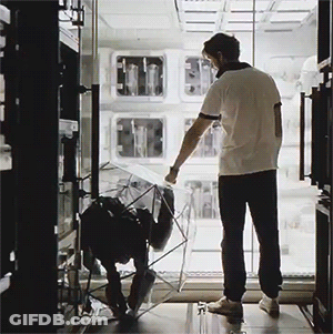 Man In White Shirt And Black Pants Standing GIF