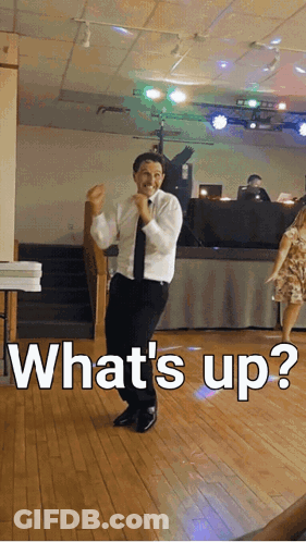 Man In White Shirt And Black Tie Dancing What's Up GIF