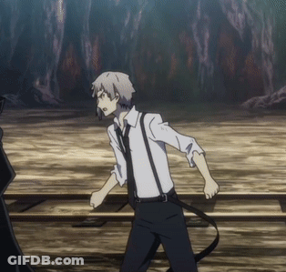 Man In White Shirt And Black Tie Next To Person In Black Suit GIF