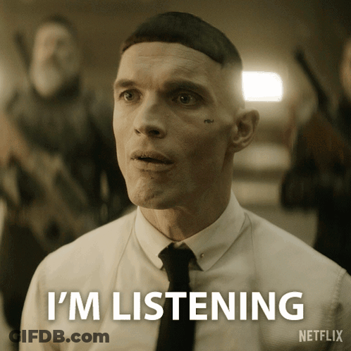Man In White Shirt And Black Tie Says Im Listening Netflix GIF