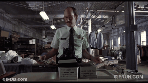 Man In White Shirt And Black Tie With Gifrun Logo GIF