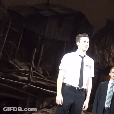 Man In White Shirt And Black Tie With Smith Name Tag GIF