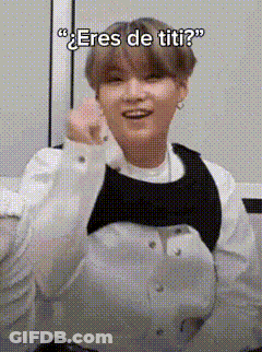 Man In White Shirt And Black Vest Making Heart GIF