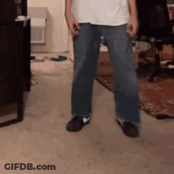 Man In White Shirt And Blue Jeans GIF