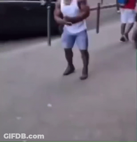 Man In White Shirt And Blue Shorts Crawling GIF