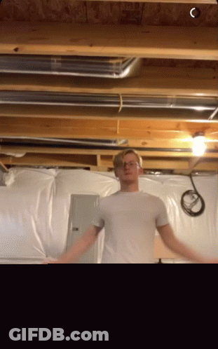 Man In White Shirt And Blue Shorts GIF