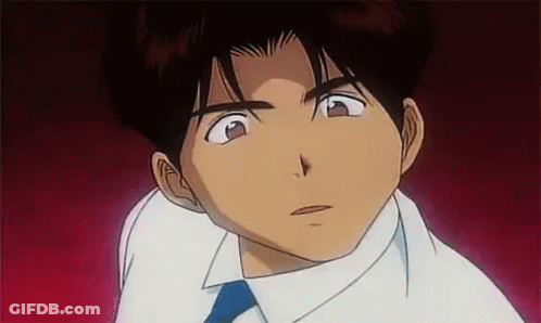 Man In White Shirt And Blue Tie Looking At Camera GIF