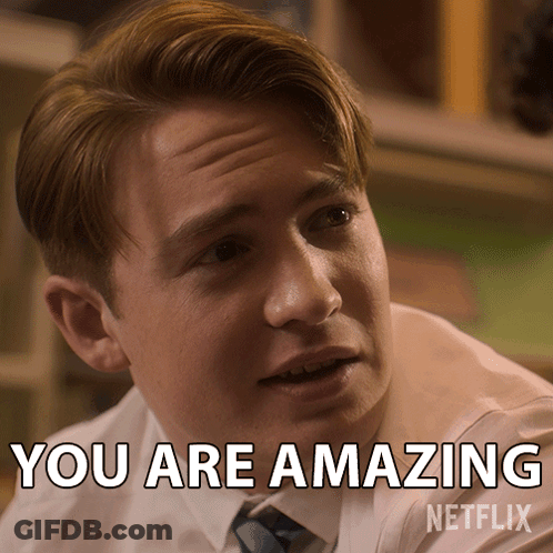Man In White Shirt And Blue Tie Saying You Are Amazing GIF
