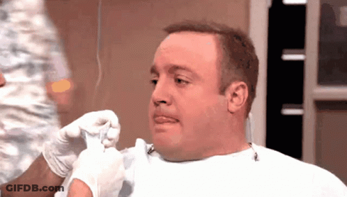 Man In White Shirt And Gloves Getting Injection GIF