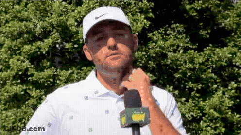 Man In White Shirt And Nike Hat Chin Rest GIF