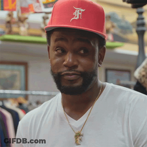 Man In White Shirt And Red Hat With Letter F GIF