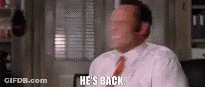Man In White Shirt And Red Tie Saying He's Back GIF