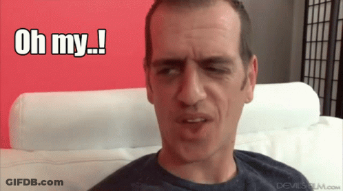 Man In White Shirt And Red Tie Saying He's Back GIF
