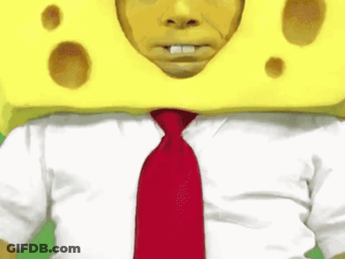 Man In White Shirt And Red Tie Wearing SpongeBob Costume GIF
