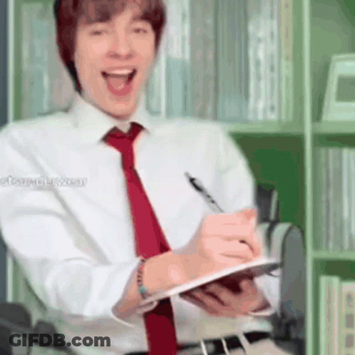 Man In White Shirt And Red Tie Writing On Clipboard GIF