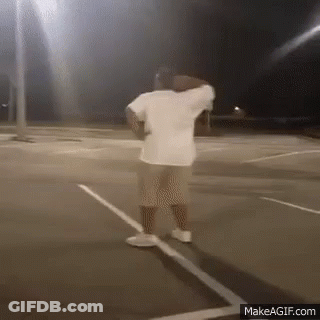 Man In White Shirt And Shorts Basketball Court Night GIF