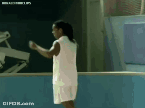 Man In White Shirt And Shorts Blue Wall Ronaldinhoclips GIF