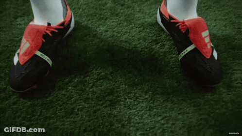 Man In White Shirt And Shorts On Soccer Field GIF