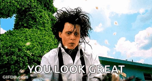 Man In White Shirt And Suspenders Saying You Look Great GIF