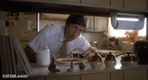 Man In White Shirt And Tie Eating Breakfast GIF
