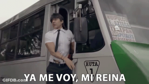 Man In White Shirt And Tie In Front Of Bus Saying Ruta 1 GIF