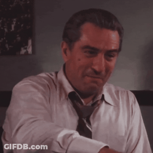 Man In White Shirt And Tie Laughing GIF