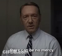 Man In White Shirt And Tie Says No Mercy GIF