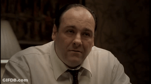 Man In White Shirt And Tie Sitting GIF