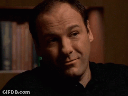 Man In White Shirt And Tie Sitting GIF